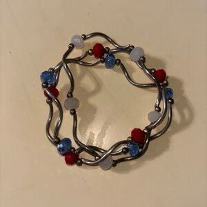 Elegant Silver Bracelets with Red and Blue Accents